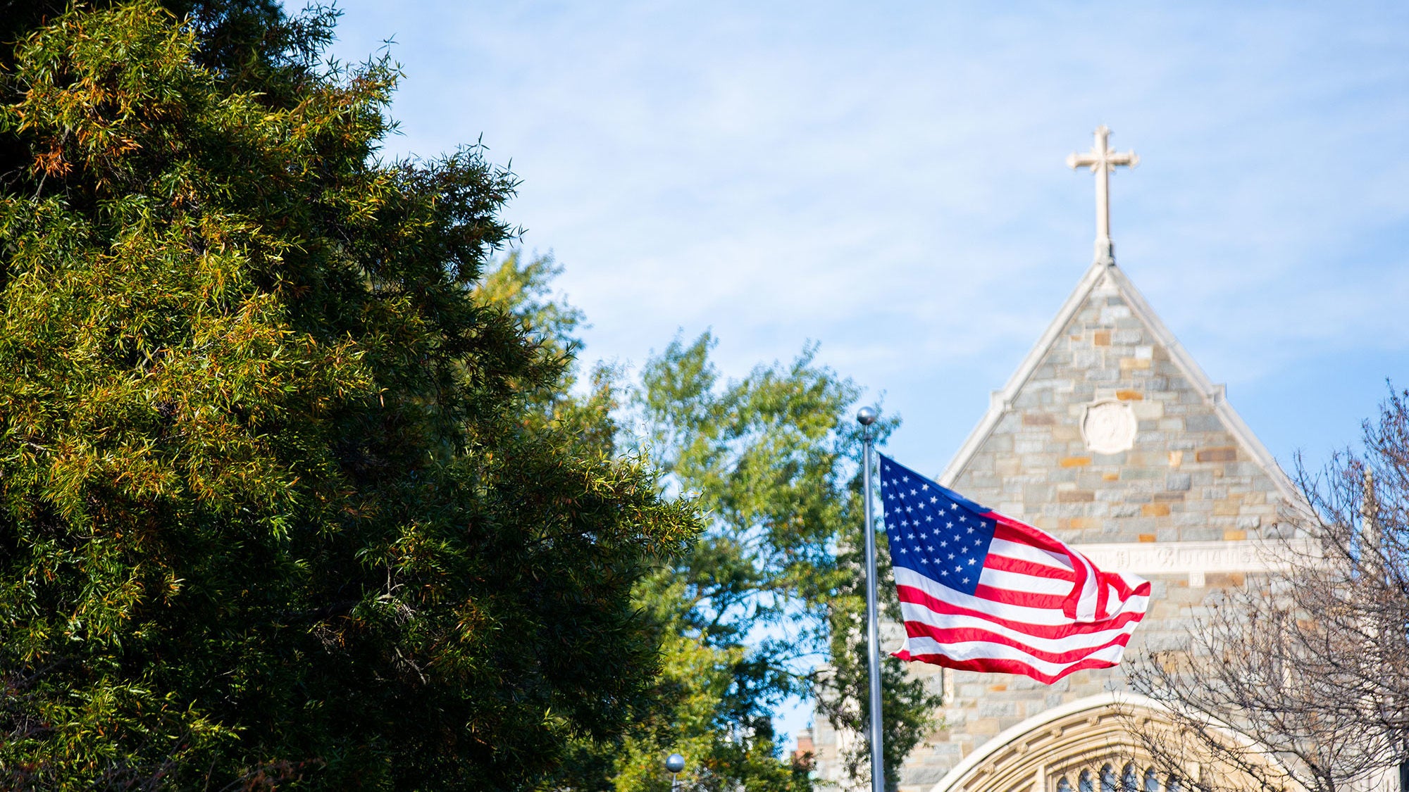 A flag waves on campus